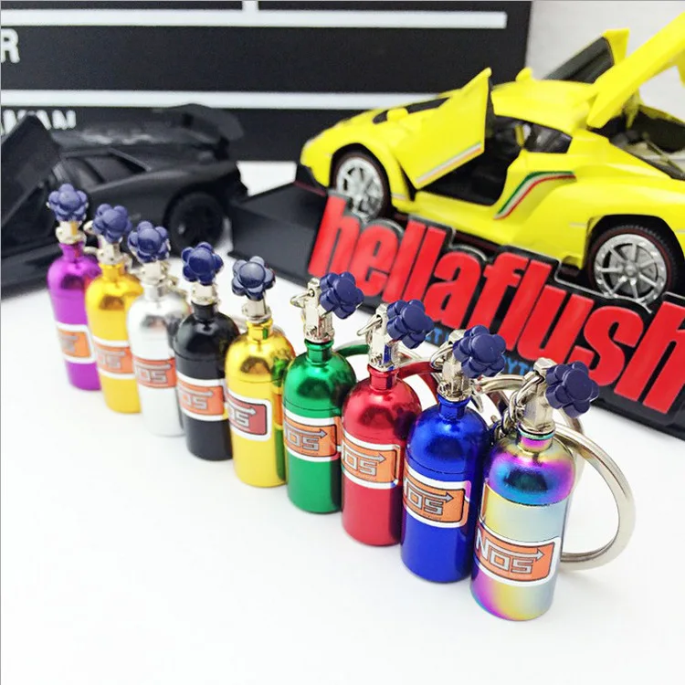 

Hot sale auto parts jdm racing acceleration nitrogen keychain metal storage tank keychain, Customized color