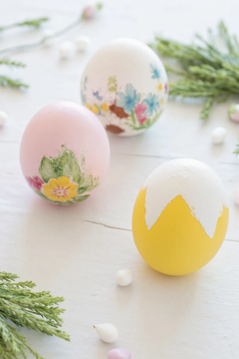 Colorful painted Easter eggs on a wooden table