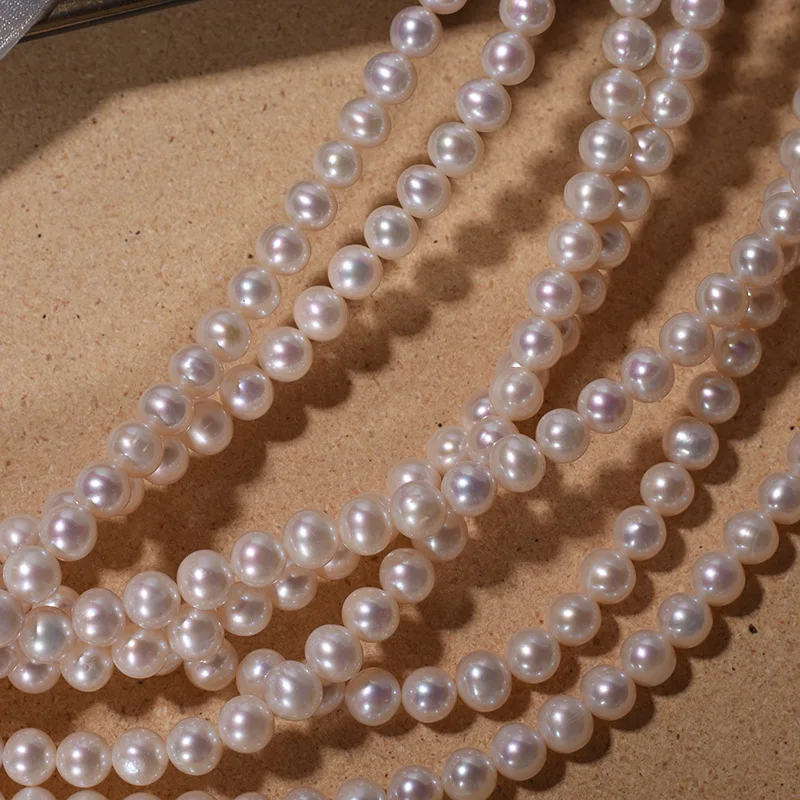 

Cultured Natural Real Freshwater Pearl Strand String Beads Wholesale Loose Round 7mm White Freshwater Pearl