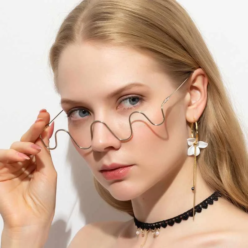 

New diamond inlaid women's glasses metal flake less fashion wave personality decorative glasses