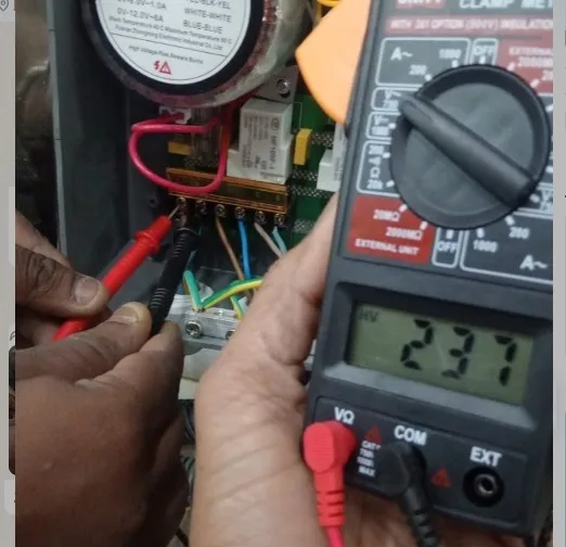 Voltage testing of spa control board with digital clamp meter
