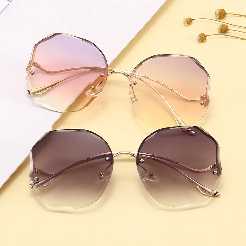 

2021 New Women Sunglasses Rimless UV400 Brand Designer High Quality Gradient Bend Leg Sun Glasses