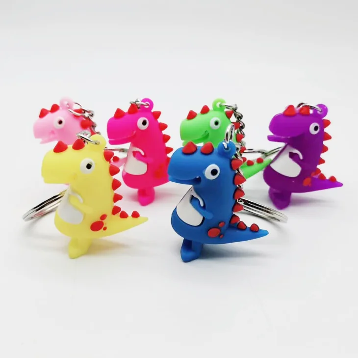 

Free shipping Creative cartoon PVC soft glue small dinosaur key ring 3D cartoon dinosaur children schoolbag pendant wholesale