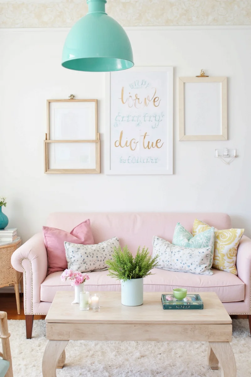 Happy family in living room decorated with Lindsay Lettering items