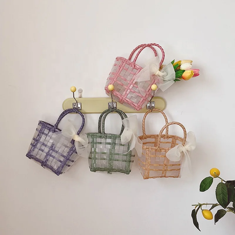 

Children's bag 2022 summer new holiday wind woven beach bag girls woven basket plastic portable bag