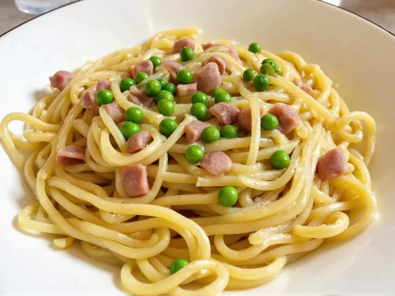 Alfredo pasta with prosciutto and peas