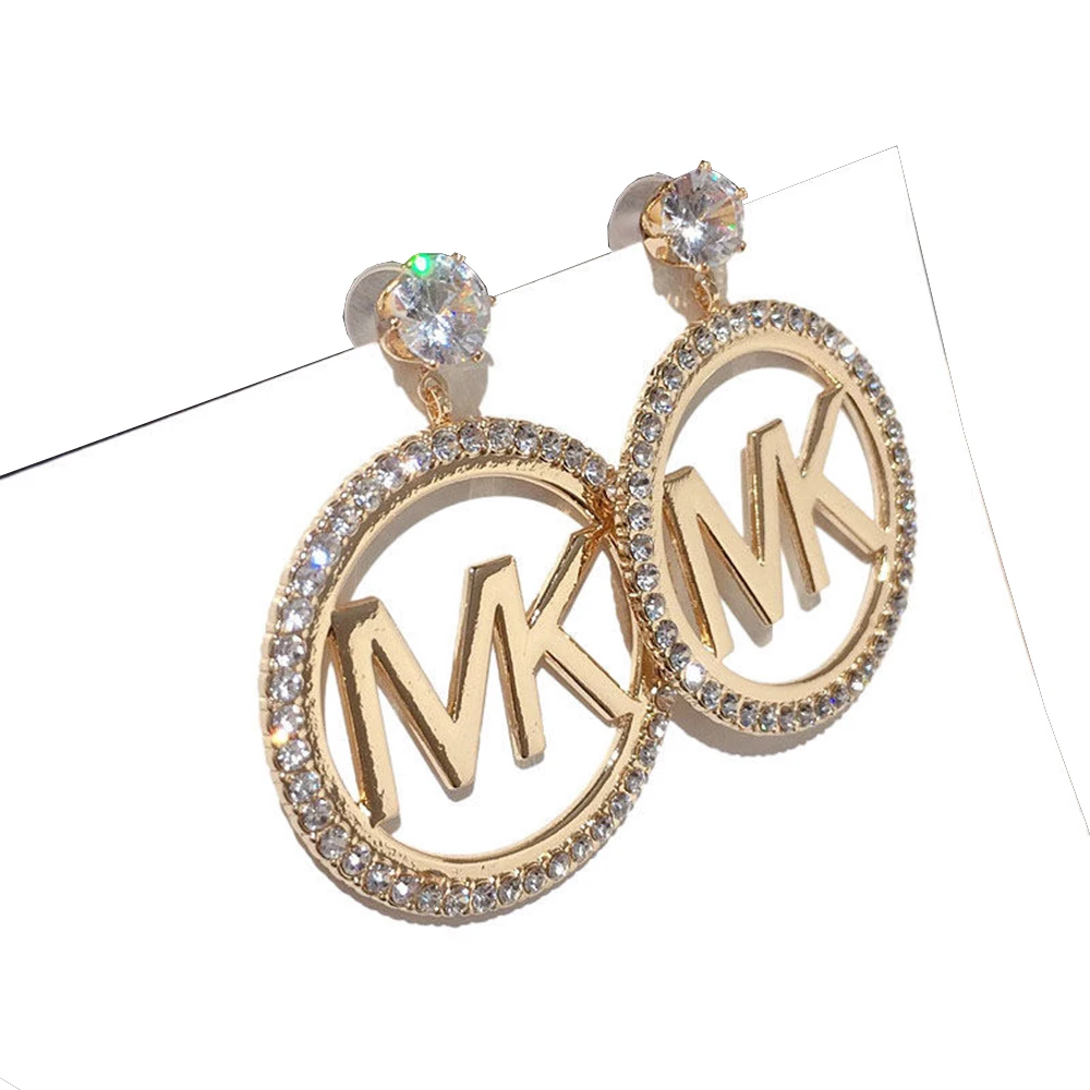 

Korean version of the new personality letter earrings oversized zircon texture metal fairy silver needle earrings female
