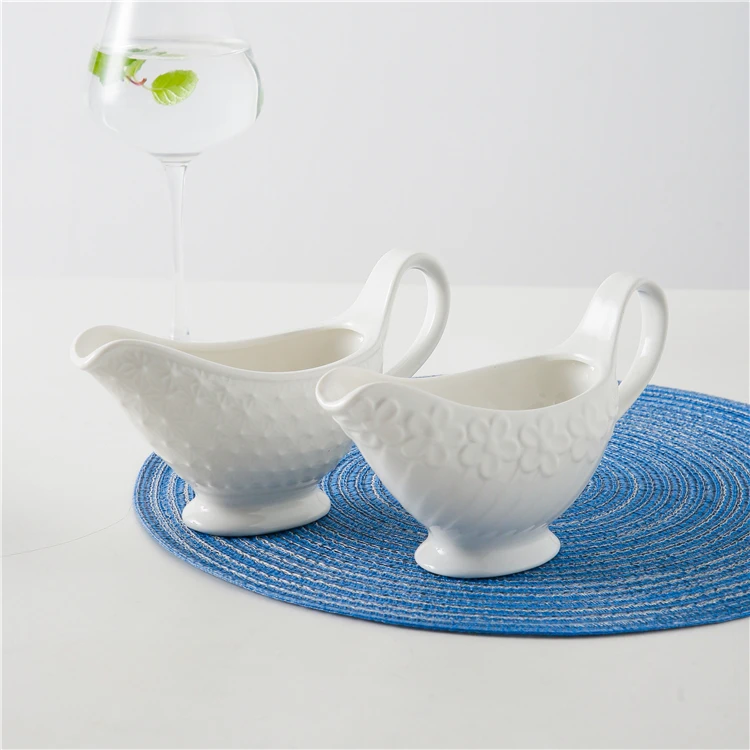 
Unique japanese restaurant spice container seasoning jug custom cheap large white ceramic sauce gravy boat 