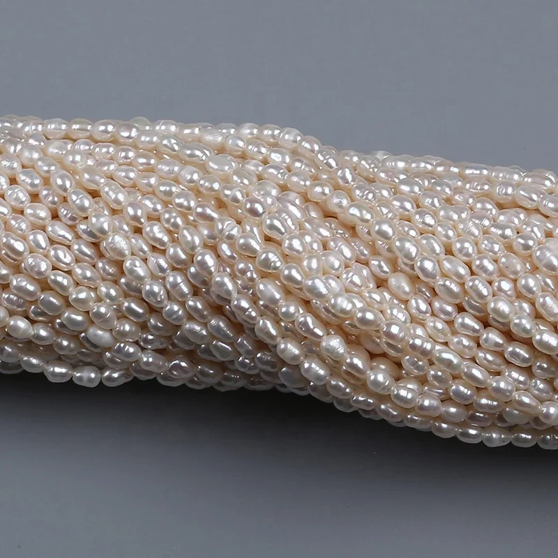 

Wholesale 2.8-3mm rice pearl strand loose rice pearl, White