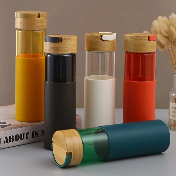 

High quality borosilicate glass water bottle with silicone rubber sleeve with custom logo