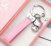 Wholesale kawaii hello kitty keychain with pink leather