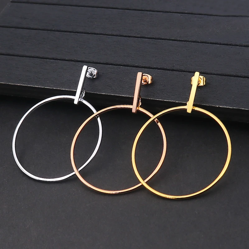 

2020 gold plated hollow out geometric dangle earrings custom daily wear long drop earrings symmetry boho titanium steel jewelry, Golden