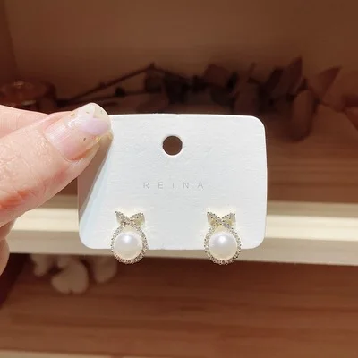 

Delicate Design Ladies Pearl Stud Earring Unique Design Micro Rhinestone Bowknot Pearl Earring For Women
