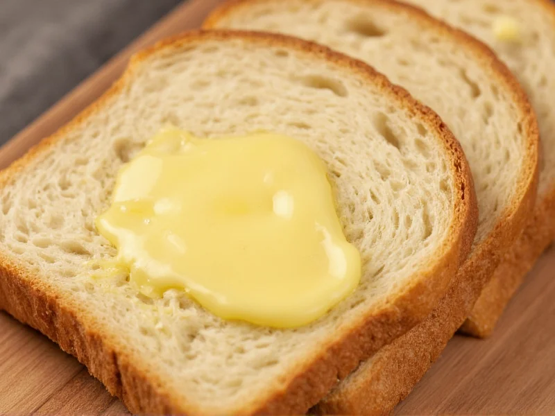 Sliced homemade bread with butter melting