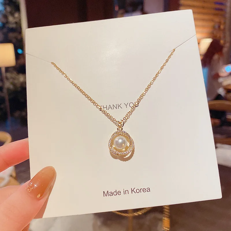 

Chic Titanium Steel Hollow Nest Pearl Pendants Necklace Shiny Diamond Circle Pearls Clavicle Chain Necklace, Picture shows