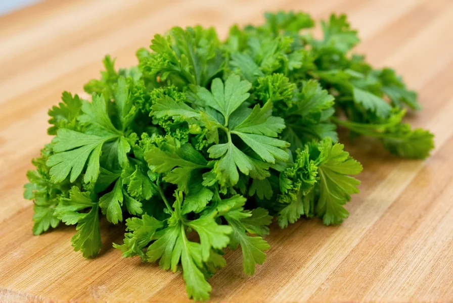Close-up view of fresh parsley leaves showing both curly and flat-leaf varieties side by side on wooden cutting board