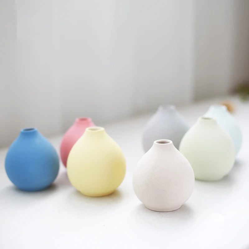 

Colorful ceramic small vase matte texture for table decoration