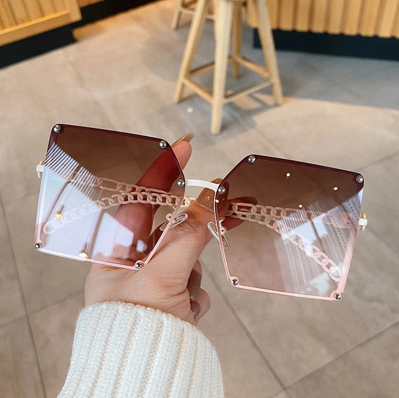 

2021 Hot Selling Fashion Designer Rimless Oversized Women Shades