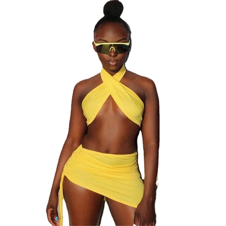 

LW1045 2021 sexy solid hanging neck backless halter women 2 pieces sets outfits club two piece short skirt set