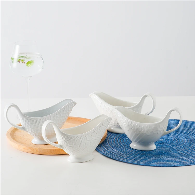 
Unique japanese restaurant spice container seasoning jug custom cheap large white ceramic sauce gravy boat 