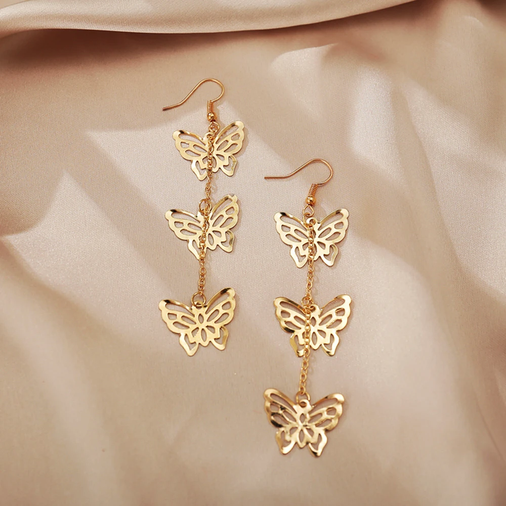 

51779 Personality joker earrings big temperament retro exaggerated butterfly golden tassel earrings pendant female earrings
