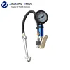 Level control tire inflating gun with dual foot chuck and function of inflating deflating and dial type pressure gauge