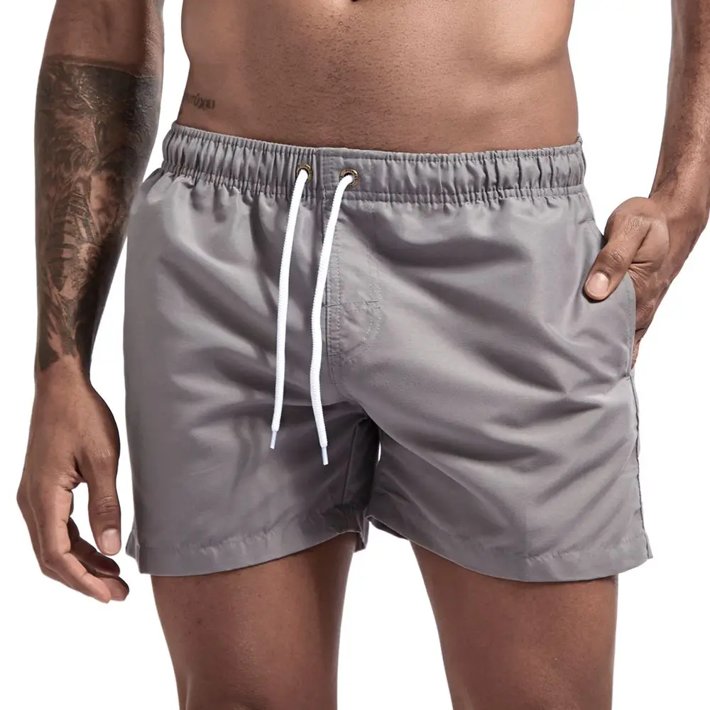 

quality men fashion beach pants 100% polyester breathable solid color large size quick-drying swimming fitness shorts for men, White