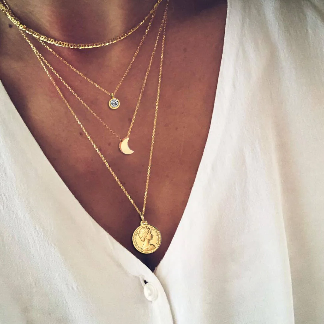 

Stainless steel simple layered necklace with crystal moon character head and long pendant necklace with creative combination