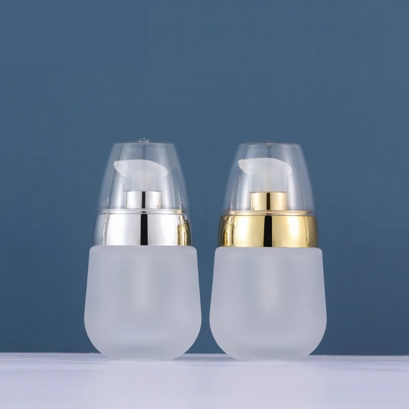

Round shape 30ml white glass cosmetic bottle with lotion pump