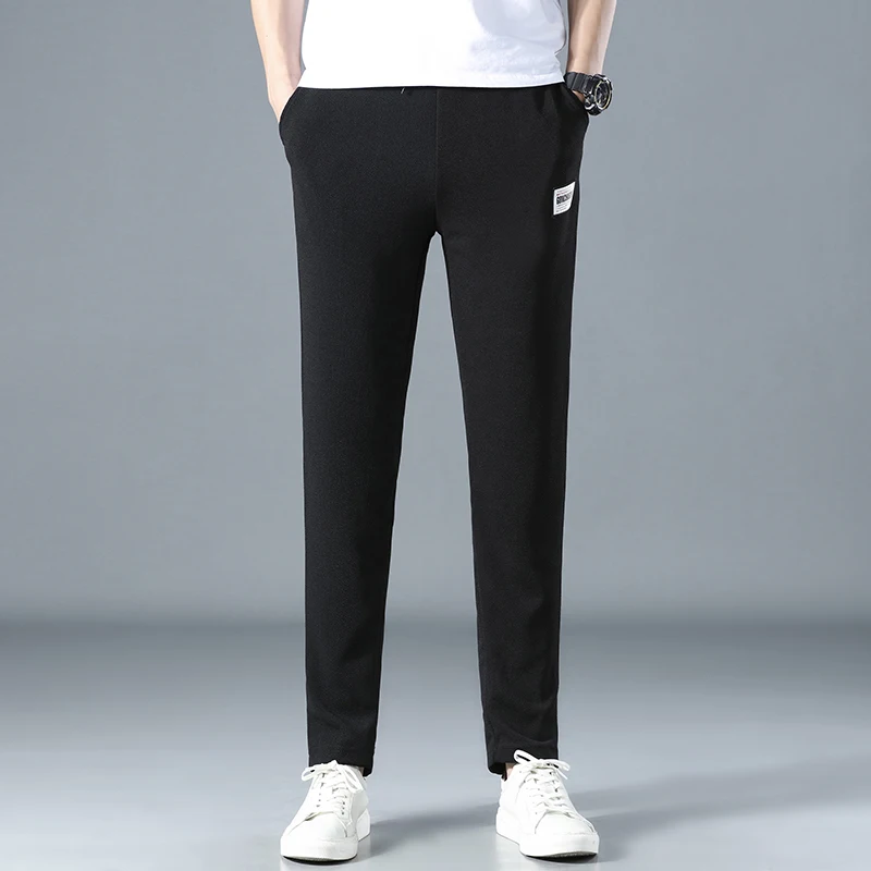 

Spring and summer new fashion trend young men elastic elastic men ant wrinkle leisure pants long pants breathable