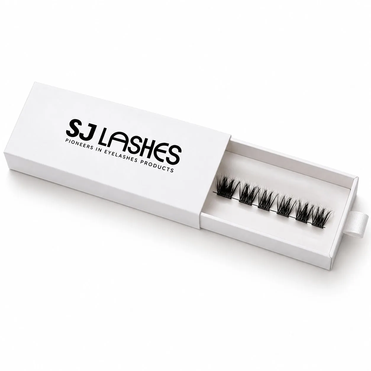 White slide out lash box opened to show the paper tray extended with one row of eight clusters and a white ribbon pull tab at the end - slide out lash box