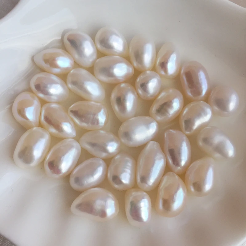 

Loose no hole 10*14 mm long drop shape irregular freshwater zhuji pearl baroque, White