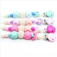 

Wholesale cheap environmentally friendly children's baby products wooden pacifier soother clip chain