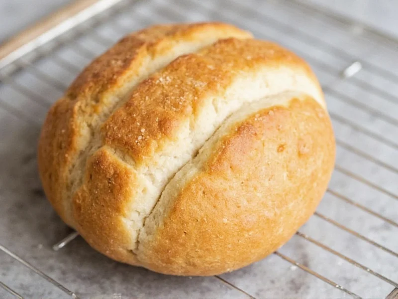 Homemade white bread cooling on wire rack