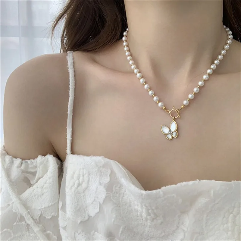

2021 Trending Fashion Gold Plated Crystal Rhinestone T Bar Toggle Faux Pearl Beaded Necklace Butterfly Choker Women