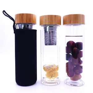 Image of eco friendly pba free wholesale custom design double wall borosilicate glass fruit tea infuser water bottle with bamboo lids
