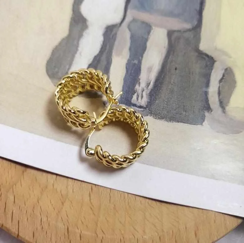 

Korean Fashion Design Hollow circle gold plated Twist Hoop retro stud earrings for female