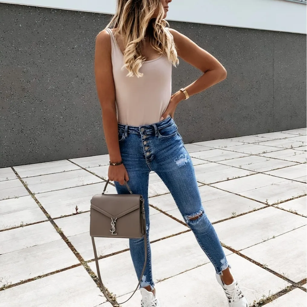 

Women's Korean Slim Fit Jeans Fashion Solid Color Ripped Hole Tassel Stretch Mid-waist Denim Pencil Long Pants Trousers