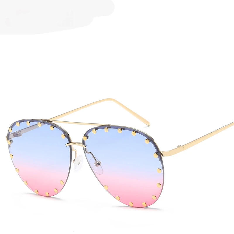 

2020 Hot Sale Frameless Vintage Sunglasses With Rivet Frame Ocean Sunglasses
