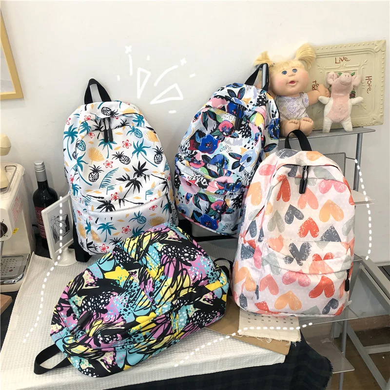 

New high school students backpack school bags Different styles love pattern backpack