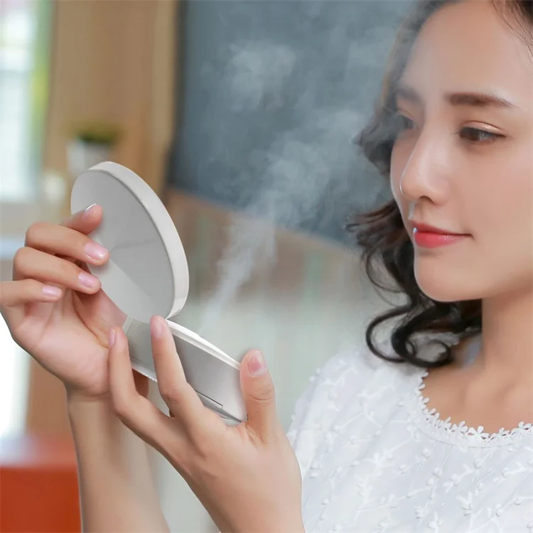

Multifunctional Portable 4 In 1 Led Makeup Pocket Mirror With Facial Steamer Nano Mist Sprayer Humidifier Power Bank