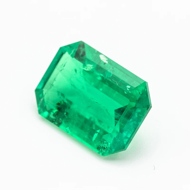 

Stone cut from Lab created rough emerald colombia emerald cut for earrings