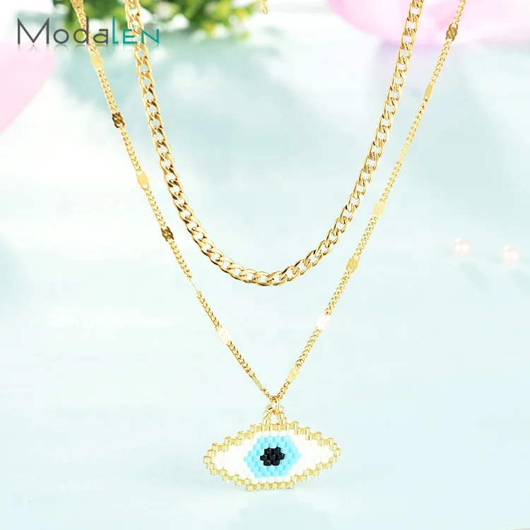 

Modalen Steel Multilayer Woman Turkish Evil Blue Eye Seed Bead Charm Necklace, Yellow gold