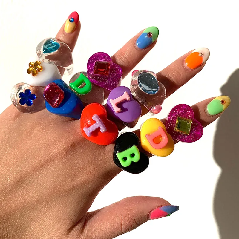 

Custom Fashion Colorful Resin Acrylic Rings Heart Letter Flower Shaped Acrylic Irregular Finger Rings