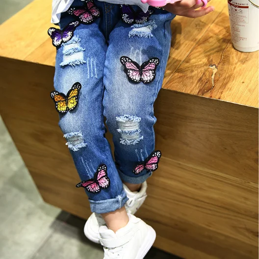 

New Design Girls Butterfly Denim Trousers Kids Fashion Washed Hole Jeans Pants