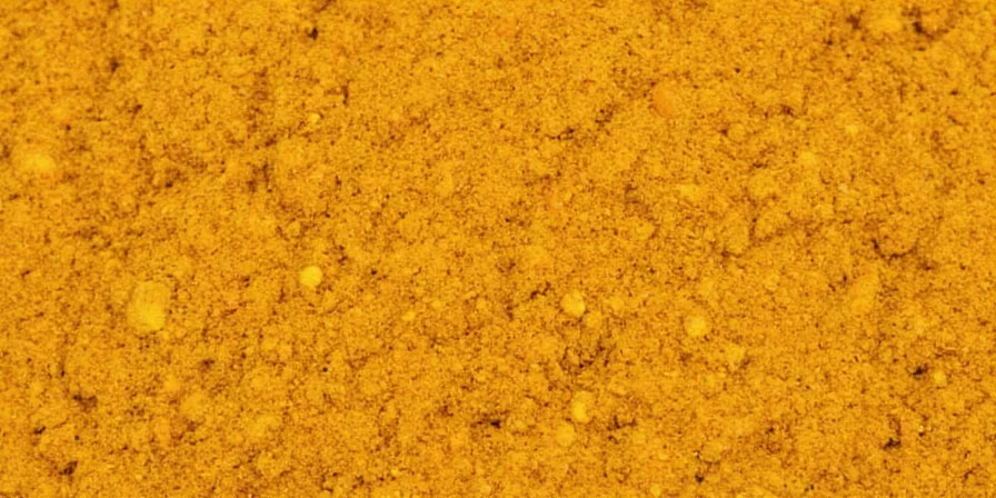 Homemade curry powder in a mortar and pestle