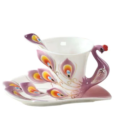 

Peacock painted porcelain tea cup, As the picture show