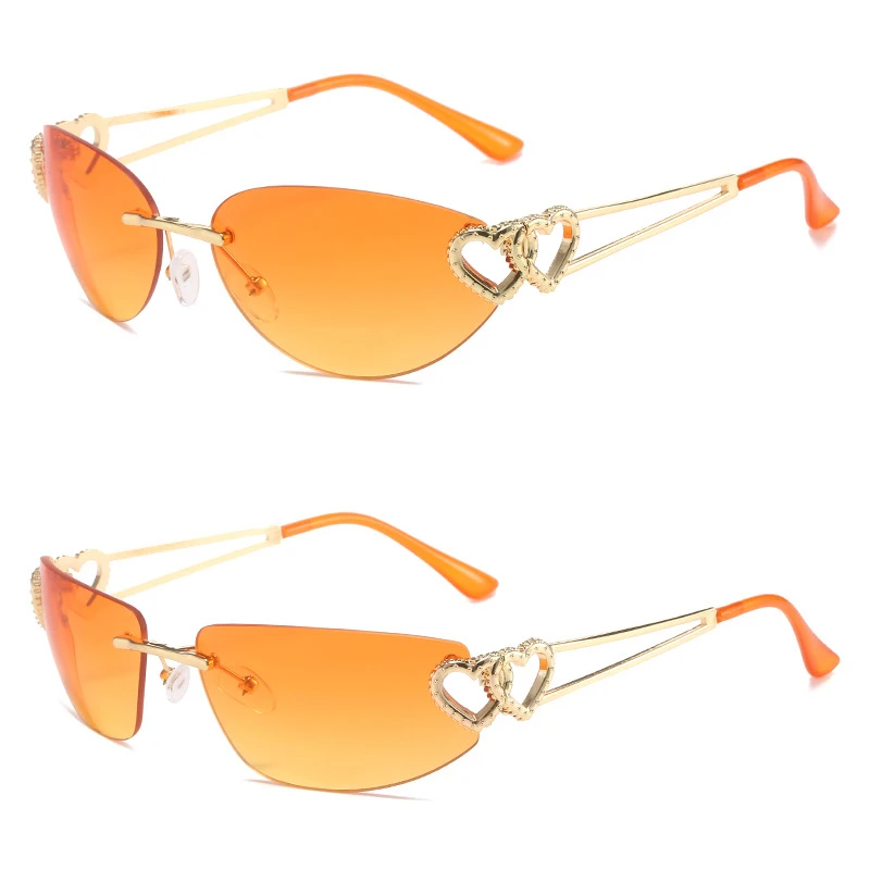 

3594 Wholesale customized logo Heart Shades Small Y2K Rimless Metal wholesale Orange lens sunglasses unisex 2023