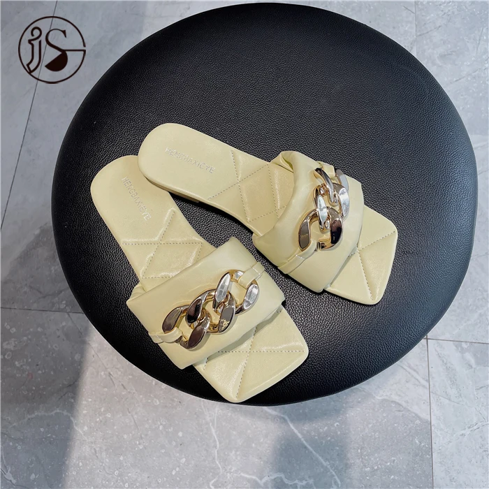 

Fashionable metal logo slippers Flat bottom one word lady slippers Summer slippers Factory hot sale at a reasonable price, Picture