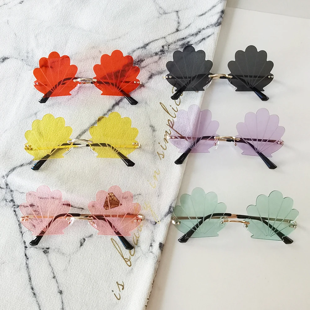 

VIFF HM20117 Seashell Shaped Women Shell Shape Eyewear Summer Candy Shades Women Designer Rimless Sunglasses River 2021, Multi and oem patone design